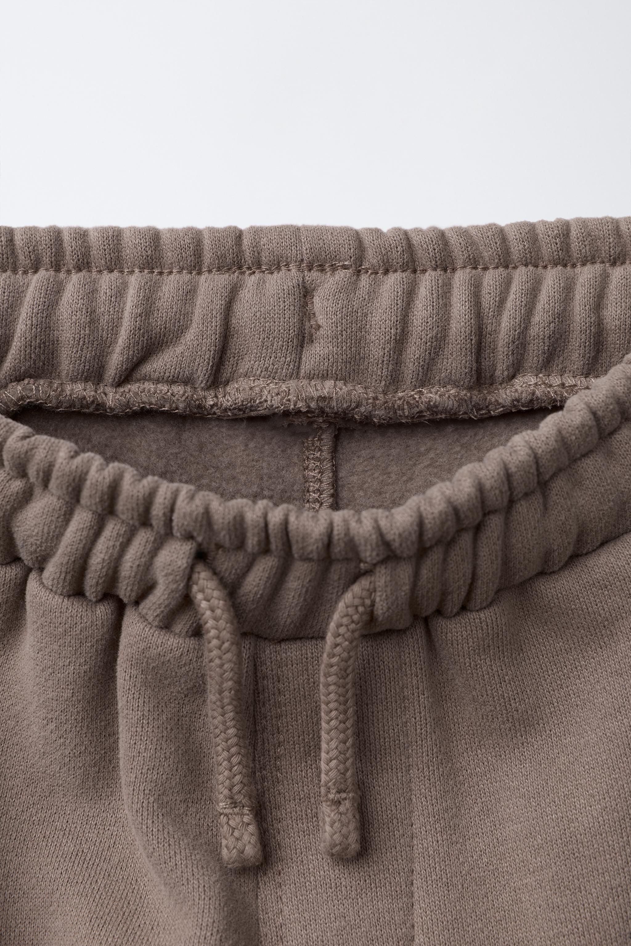 STRAIGHT PLUSH PANTS WITH RAISED LOGO